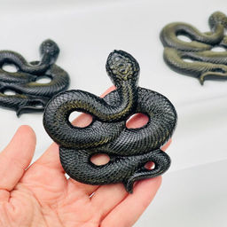 Фигурка "Змея" из золотистого Обсидиана