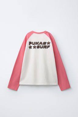 CAMISETA MANGA RANGL?N PUKAS SURF / Rosa / Blanco