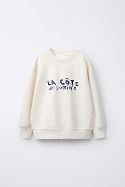 SUDADERA TEXTO BORDADO / Crudo medio