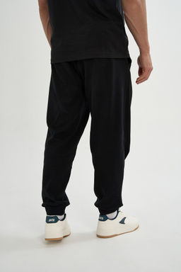 Брюки трикотажные Черный ANTA SPORTS CLUB Knit Track Pants фото 6
