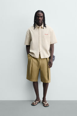 BERMUDA RELAXED FIT PLIEGUES / Tostado