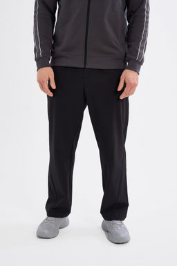 Брюки текстильные Черный ICONIC Woven Track Pants - Anta фото 2
