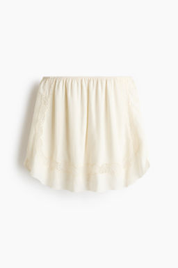 Minifalda de viscosa con inserciones de encaje
