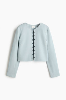 Chaqueta con ribetes festoneados