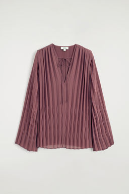 BLUSA PLISADA CON LAZO FRONTAL