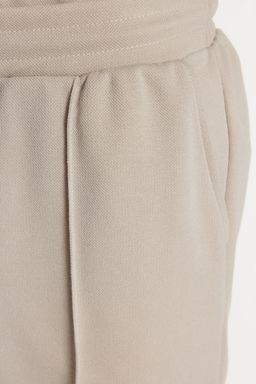 Tas Regular/Normal Kesim Orta Boy Dokulu Lastik Belli Dikis Detayl? Pike Sort TMNSS23SR00042