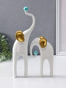 Сувенир полистоун "Слоны. Гофре" белый с золотом набор 2 шт 5х10х16,5 5,5х16,5х29,5 см