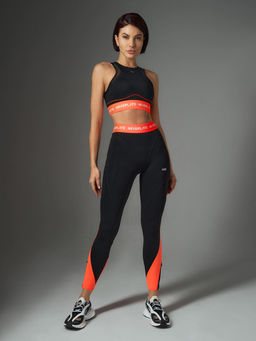 Спортивный топ-бра с яркой брендированной резинкой - NEVERLATE фото 5