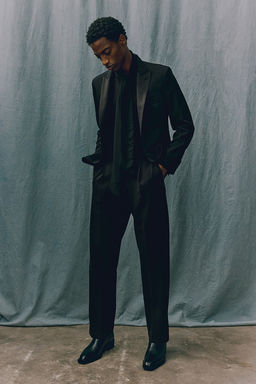 Pantalon con raya Relaxed Fit