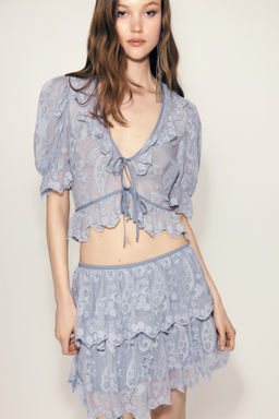 Blusa de volantes con dise?o bordado - H&m фото 3