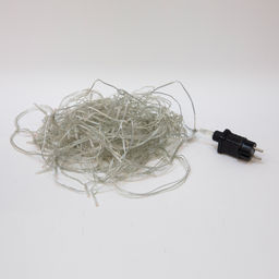 ULD-B12006-195/TTK AMBER IP44 Бахрома светодиодная с эффектом мерцания, 12м. Соединяемая. 195 светодиодов. Янтарный свет. Провод прозрачный. ТМ Uniel