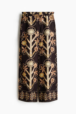 Pantal?n de sarga con estampado floral