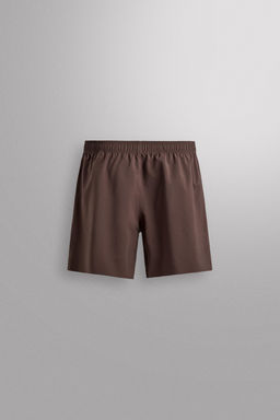 PANTALONES CORTOS ENTRENAMIENTO 9" / Marr?n