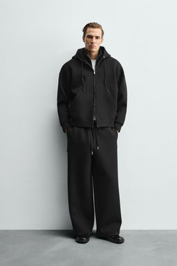 PANTAL?N JOGGER T?CNICO WIDE FIT / Negro