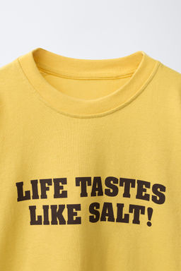 CAMISETA TEXTO PUKAS SURF / Amarillo