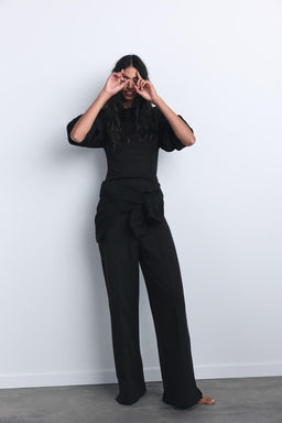 INTERLOCK KNIT TROUSERS WITH VENTS