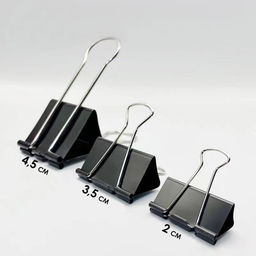 Зажим для бумаг черный 60 мм большой 20×6×4.5 см в пакете