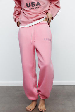 WASHED-EFFECT PLUSH TROUSERS WITH SLOGAN - Zara фото 2