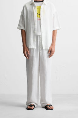 CRINKLED-EFFECT TROUSERS - Zara фото 2