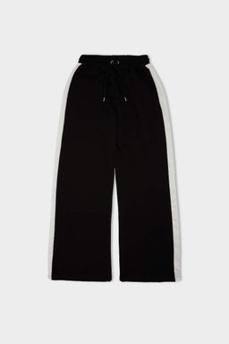 Стильные широкие спортивные штаны с широкими штанинами, эластичным поясом и полосками - Defacto фото 7