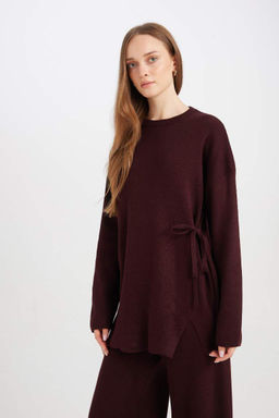 Женский однотонный трикотажный свитер-туника стандартного кроя с круглым вырезом и завязками по бокам - Defacto фото 3