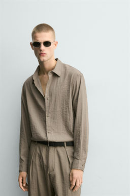 PANTAL?N FLUIDO RELAXED FIT EFECTO ARRUGADO / Beige - Zara фото 6
