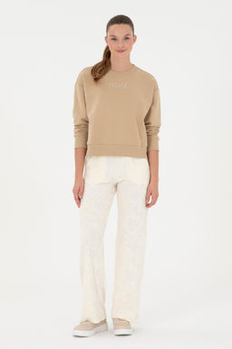 Женские кремовые спортивные штаны