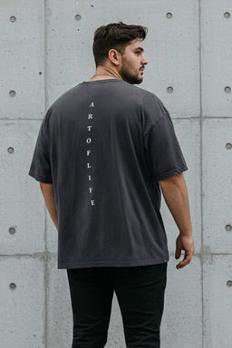 TRENDYOL MAN Buyuk Beden Antrasit Oversize/Genis Kesim Soluk Efektli Bask?l? %100 Pamuklu T-Shirt TMNSS25BF00014