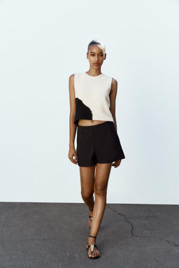 SLEEVELESS KNIT TOP