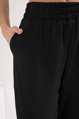 TRENDYOLMILLA Siyah Yumusak Tuseli Nervurlu Esnek Orme Pantolon TWOSS25PL00074  фото 3