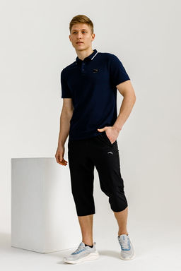 Брюки текстильные укороченные Anta Sports Classic  фото 4