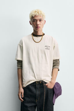 CAMISETA TEXTOS ESTAMPADOS / Blanco
