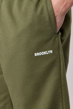 Haki Regular/Normal Kesim Orta Boy Yaz? Bask?l? Sort TMNSS21SR0377