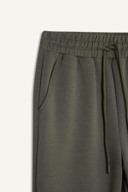 Длинные спортивные штаны для джоггеров стандартной посадки DeFactoFit с карманами и эластичными брючинами на талии  фото 2