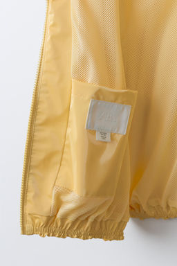 CHUBASQUERO BRILLO WATER RESISTANT / Amarillo