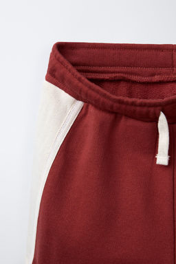 EMBROIDERED PLUSH BERMUDA SHORTS