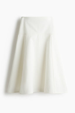 Falda denim de corte evas?