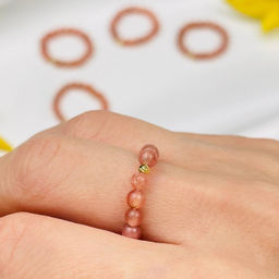 Кольцо на резинке из Родохрозита 17 р.