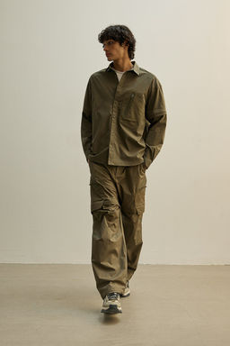 Camisa deportiva zip-off en DryMove Loose Fit - H&m фото 3