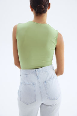 Top sin mangas en microfibra - H&m фото 5