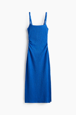 Vestido midi en punto con textura