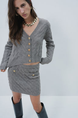 Cardigan en punto trenzado