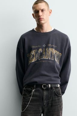 WASHED SWEATSHIRT WITH SLOGAN PRINT