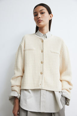 Cardigan corto en punto con textura