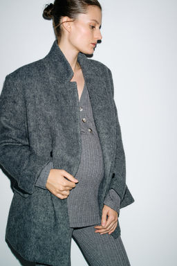 MAMA Top en punto de canale con escote en V