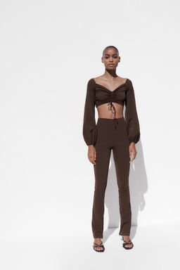 ELASTICATED LEGGINGS WITH ZIP