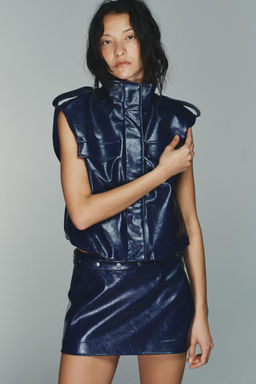 LOW-RISE FAUX LEATHER MINI SKIRT WITH STUDS - Zara фото 2