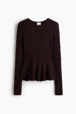 Top de peplum con cuentas decorativas