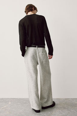 Pantalon brillante con textura Relaxed Fit - H&m фото 3