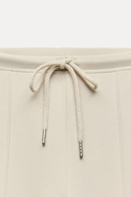 STITCHED INTERLOCK BELL BOTTOM TROUSERS - Zara фото 18